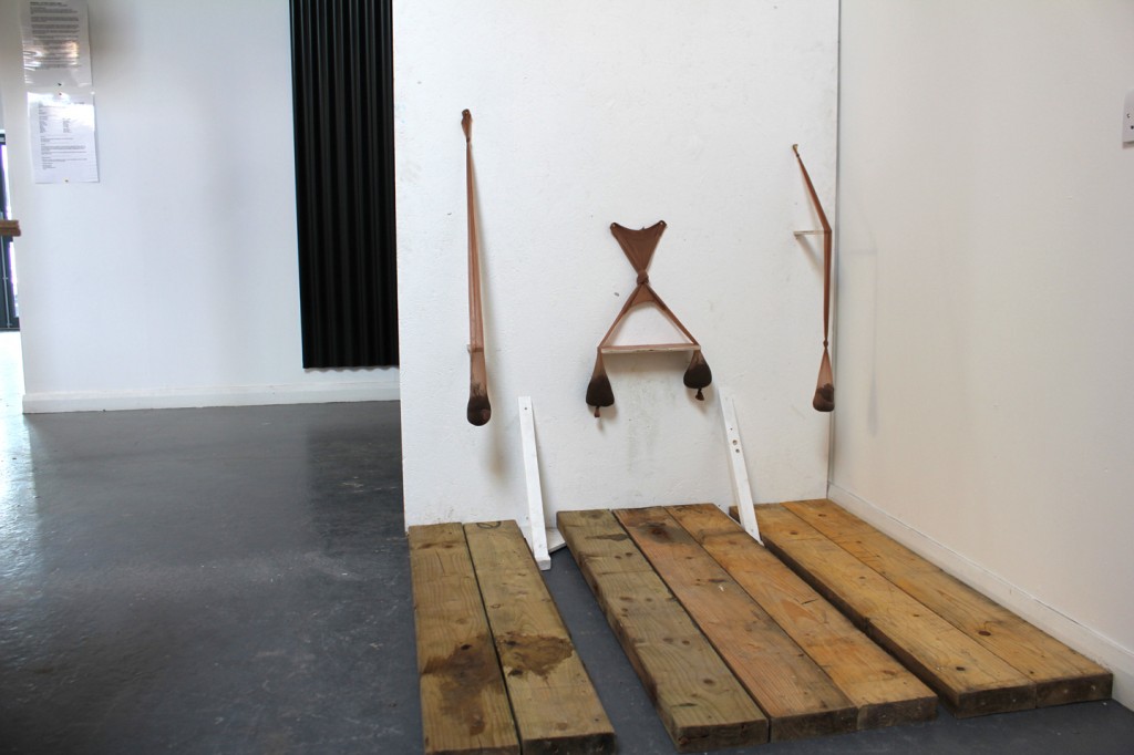 The Balance Between I, Installation View, nude stockings, found dirt & scrap wood