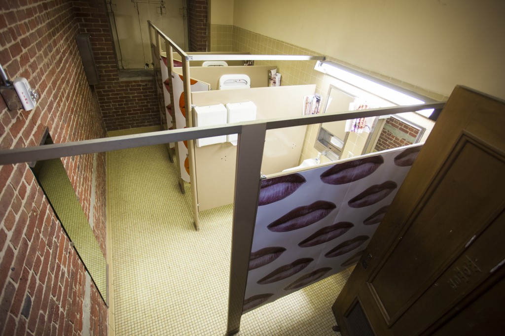 XX (KISS KISS), by Elizabeth Cayne, a site-specific installation in the women's bathroom of the Old Mint. Photo documentation by Mido Lee. 